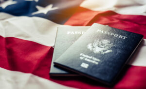 an american flag with two us passports